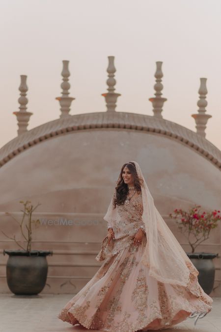 Photo of bridal portrait on wedding day in lehenga