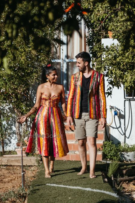 Photo of couple coordinating in matching outfits