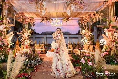 Photo of White and red unique Sabyasachi bridal lehenga