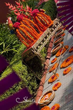 Photo of genda flower table setting