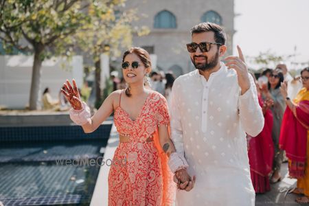 Photo of candid couple portrait on haldi day