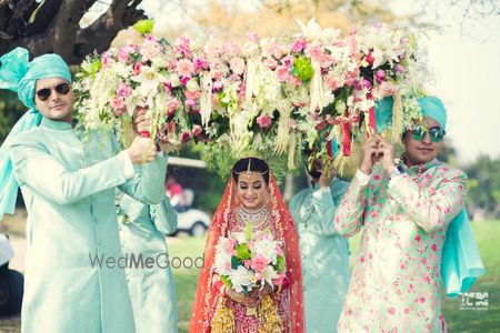 Photo of Bridal entry with matching brothers