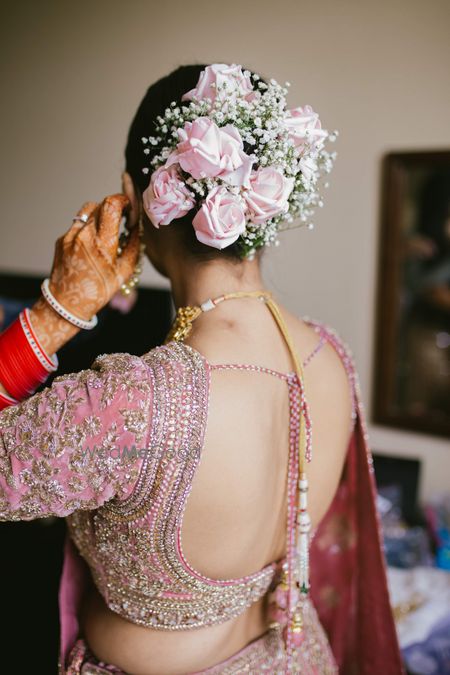 Photo of Beautiful floral hair bun