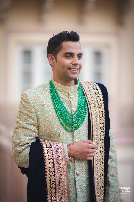 Photo of Groom necklace with green beads and velvet dupatta