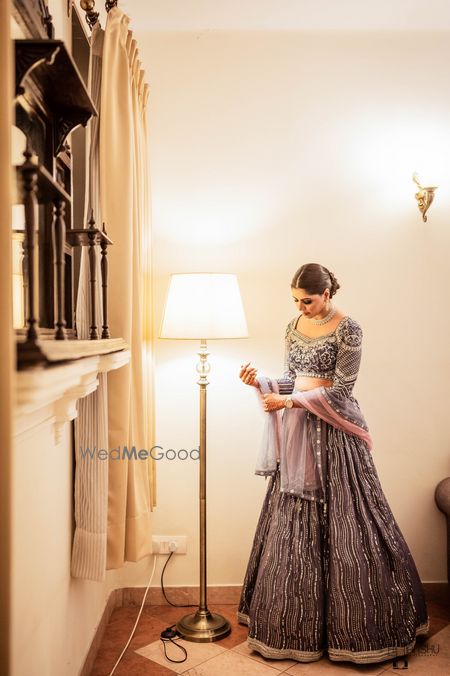 Photo of A lilac lehenga with full sleeves embellished blouse