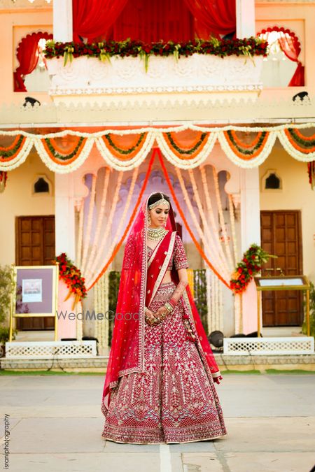 Photo of Ruby red lehenga by anita dongre