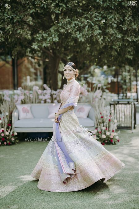 Photo of colorful pastel bridesmaid lehenga with mathapatti