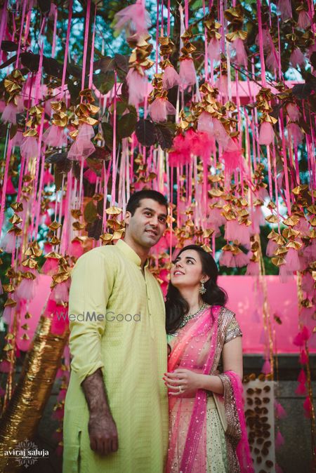 Photo of neon pink mehendi decor