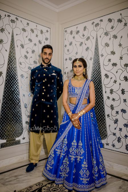 Photo of Couple in coordinated outfits for sangeet