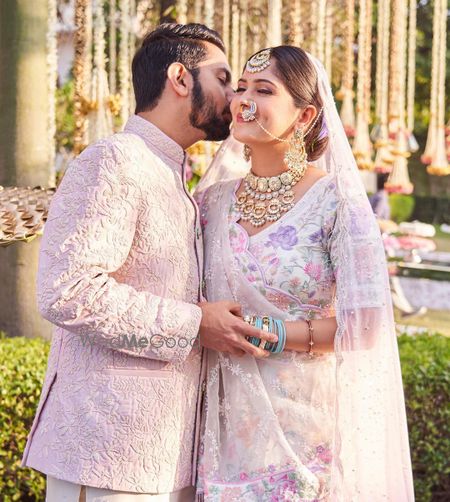 Photo of Bride in a unique pastel wedding lehenga