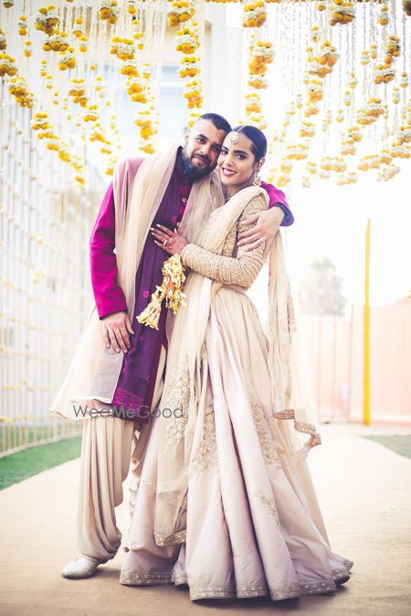 Photo of Contrasting bride and groom minimal outfits