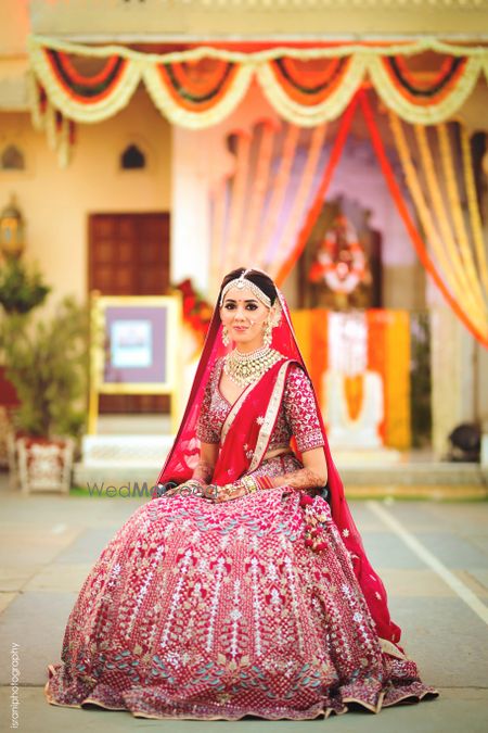 Photo of Anita dongre ruby red bridal lehenga