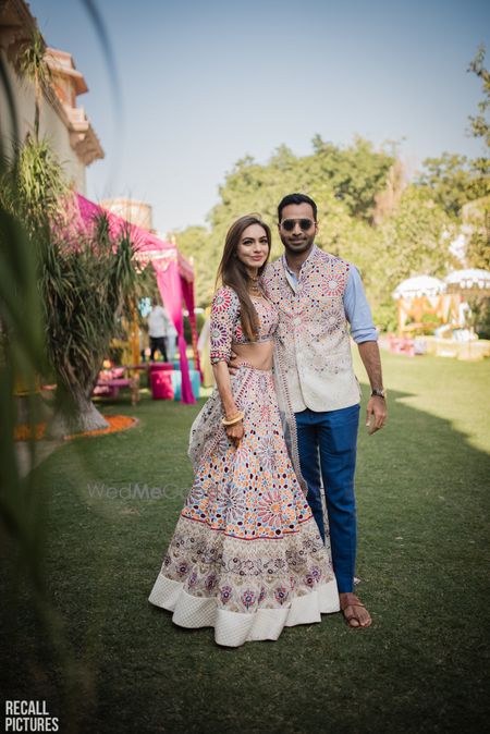 Photo of Twinning mehendi bride and groom look