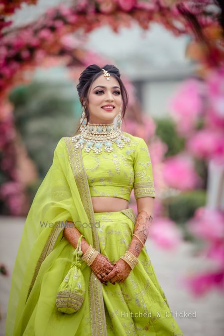 Photo of Light green sabya lehenga for mehendi with pastel jewellery