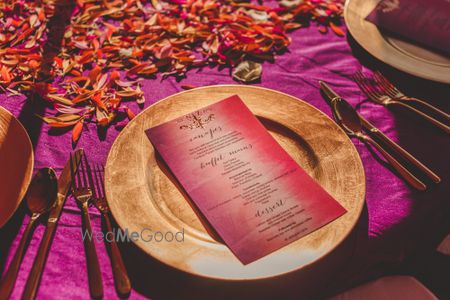 Photo of Menu on gold plate at Indian wedding