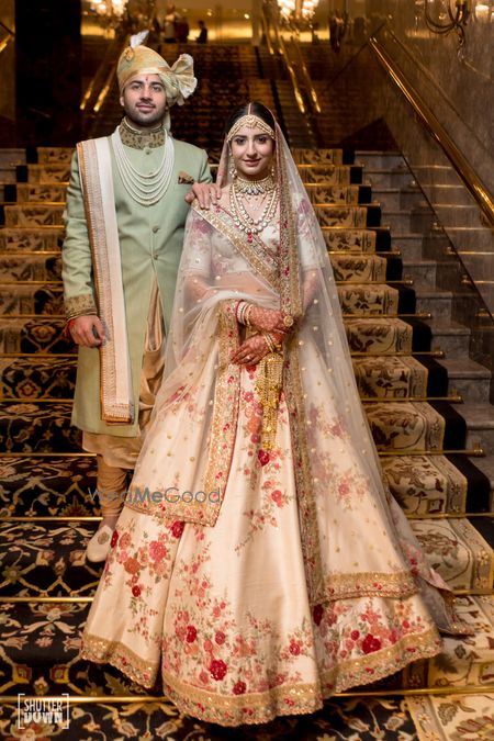 Photo of Floral print ivory sabyasachi bridal lehenga