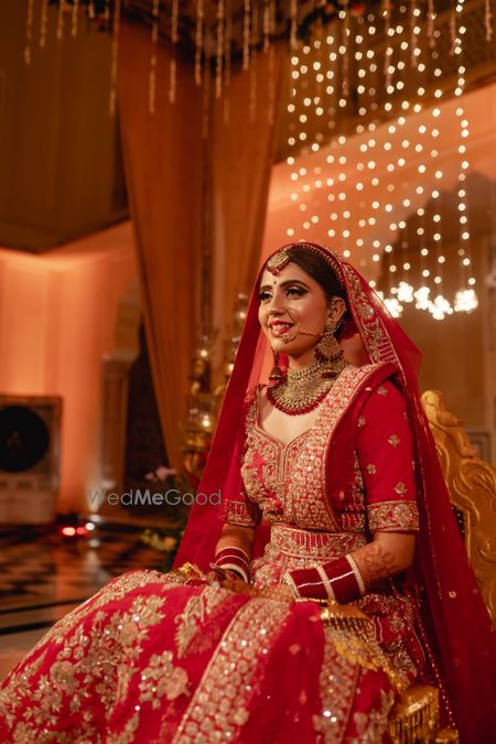 Photo of Bride in a red lehenga