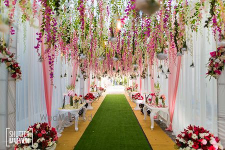 Photo of Entrance decor with hanging floral strings