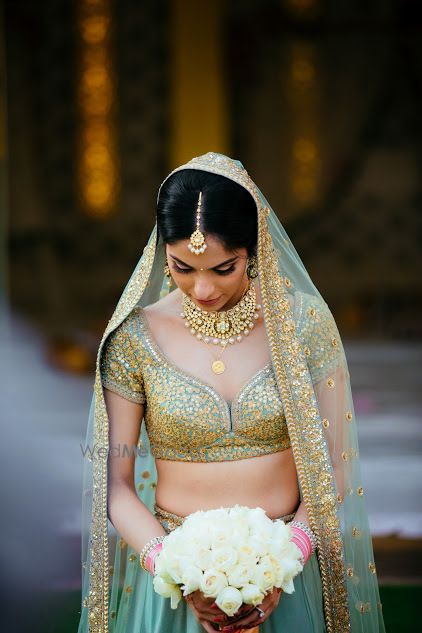 Photo of Pretty bridal portrait with white bouquet