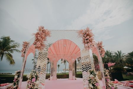 Photo of unique mandap decor idea with peach theme and mirrors