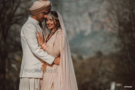 Photo of Romantic couple shot with both in pastels