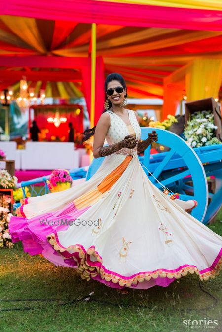 Photo of Mehendi outfit in white with pink lining