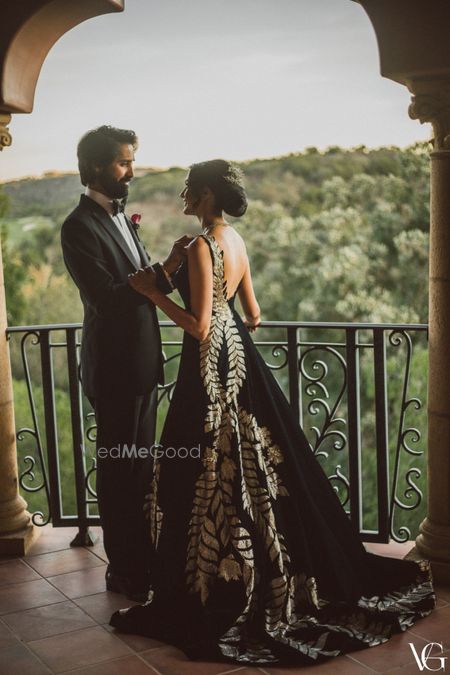 Photo of Couple cocktail portrait with bride in a manish malhotra gown