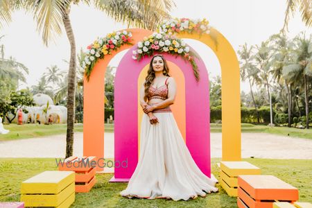 Photo of Haldi Bridal Outfit with colorful top and ivory skirt