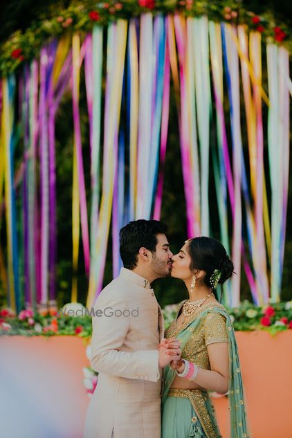 Photo of Couple kissing shot against photobooth