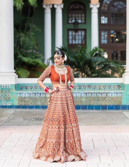 Photo of Anita Dongre bridal lehenga burnt orange