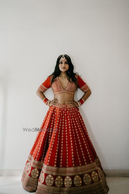 Photo of Bride in Sabyasachi red lehenga