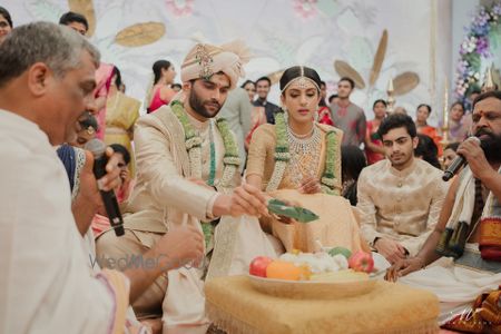 Photo of pretty south indian wedding photo during ceremony