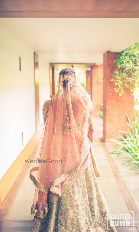 Photo of Peach and mint bridal lehenga