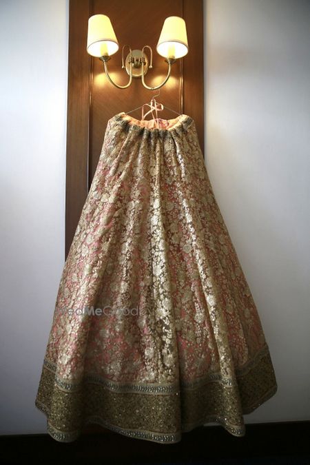 Photo of light pink and gold lehenga