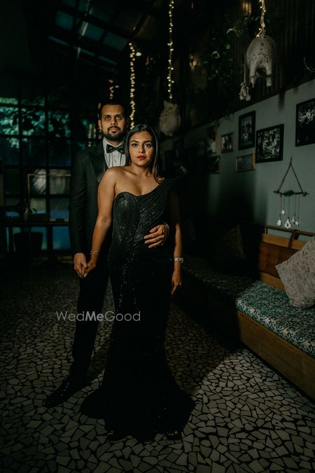 Photo of classy couple portrait at home wedding in cocktail