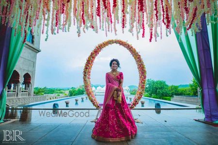 Photo of Bride on mehendi against simple photobooth