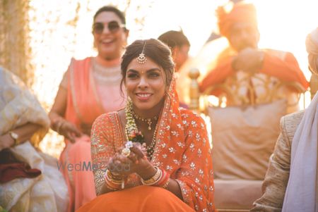 Orange Wedding Photoshoot & Poses Photo orange bridal lehenga