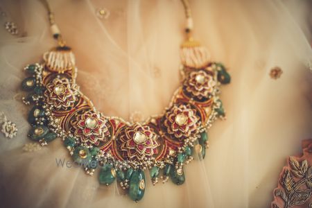 Photo of A close up shot of a bridal necklace