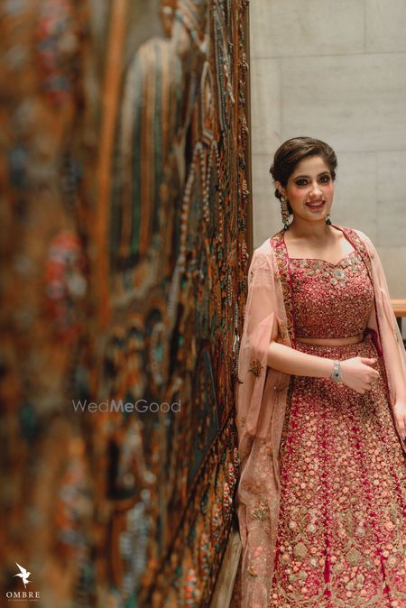 Photo of A bride to be in a shimmer lehenga for her engagement ceremony