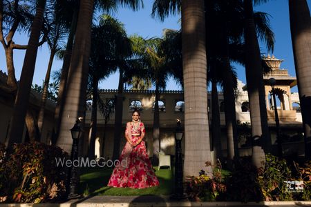 Photo of Beautiful bridal portrait of a bride in a red lehenga