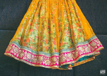 Photo of yellow layered lehenga