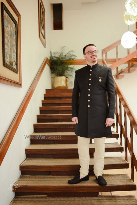 Photo of groom sangeet outfit with black bandhgala