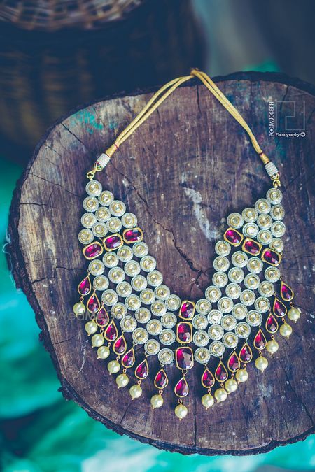 Photo of Ruby and pearl necklace with diamonds