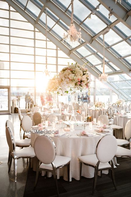 Photo of Floral table centerpiece fot a white-themed reception