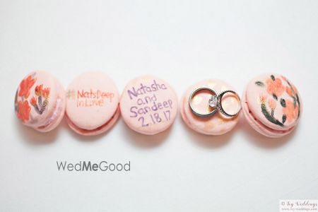 Photo of Cute personalised engagement ring shot with pastel macarons