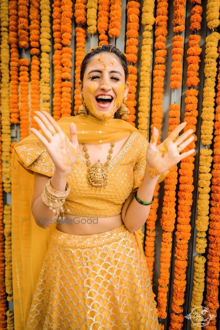 Photo of Haldi bridal portrait in yellow lehenga