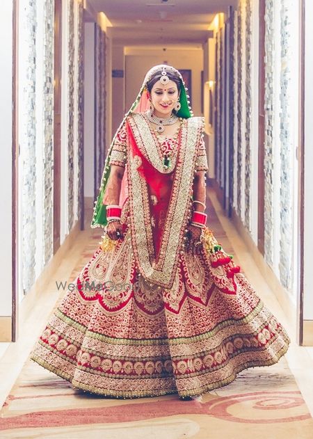 Photo of heavy red bridal lehenga