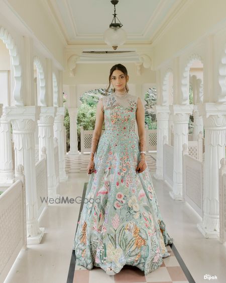 Photo of Gorgeous gown in powder blue with floral detailing and diamond jewellery