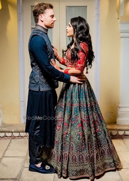 Photo of modern lehenga in orange and deep green for sangeet