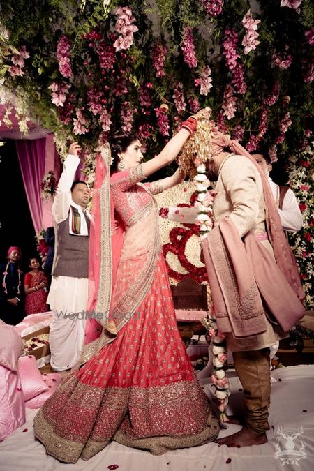 Photo of red bridal lehenga by Sabyasachi with double dupatta